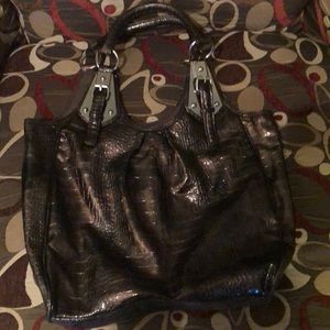 Free with purchase of regular price item.  Purse